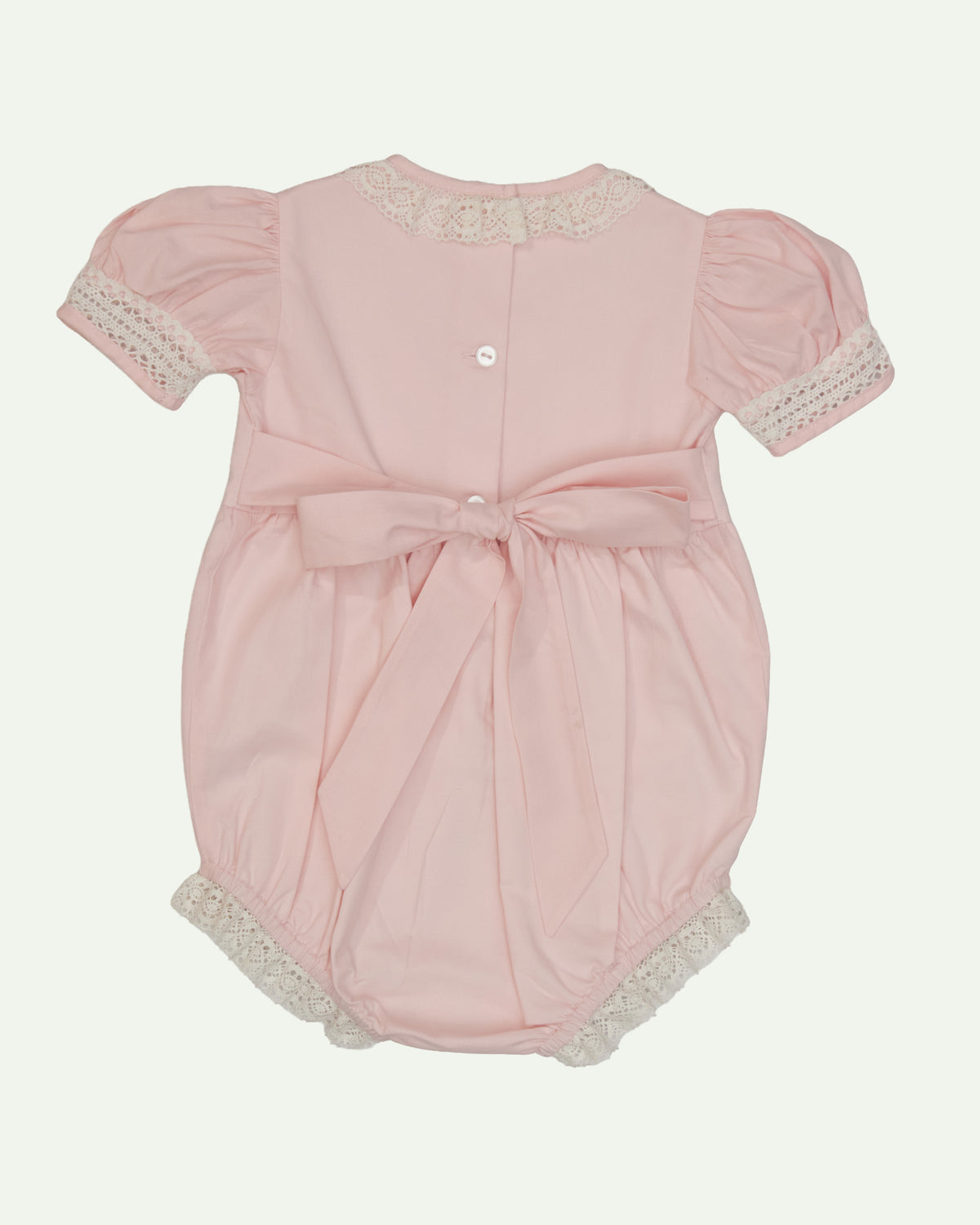 Flat lay back of baby girl soft pink cotton bubble — Anne Bubble by Bonbon Rue
