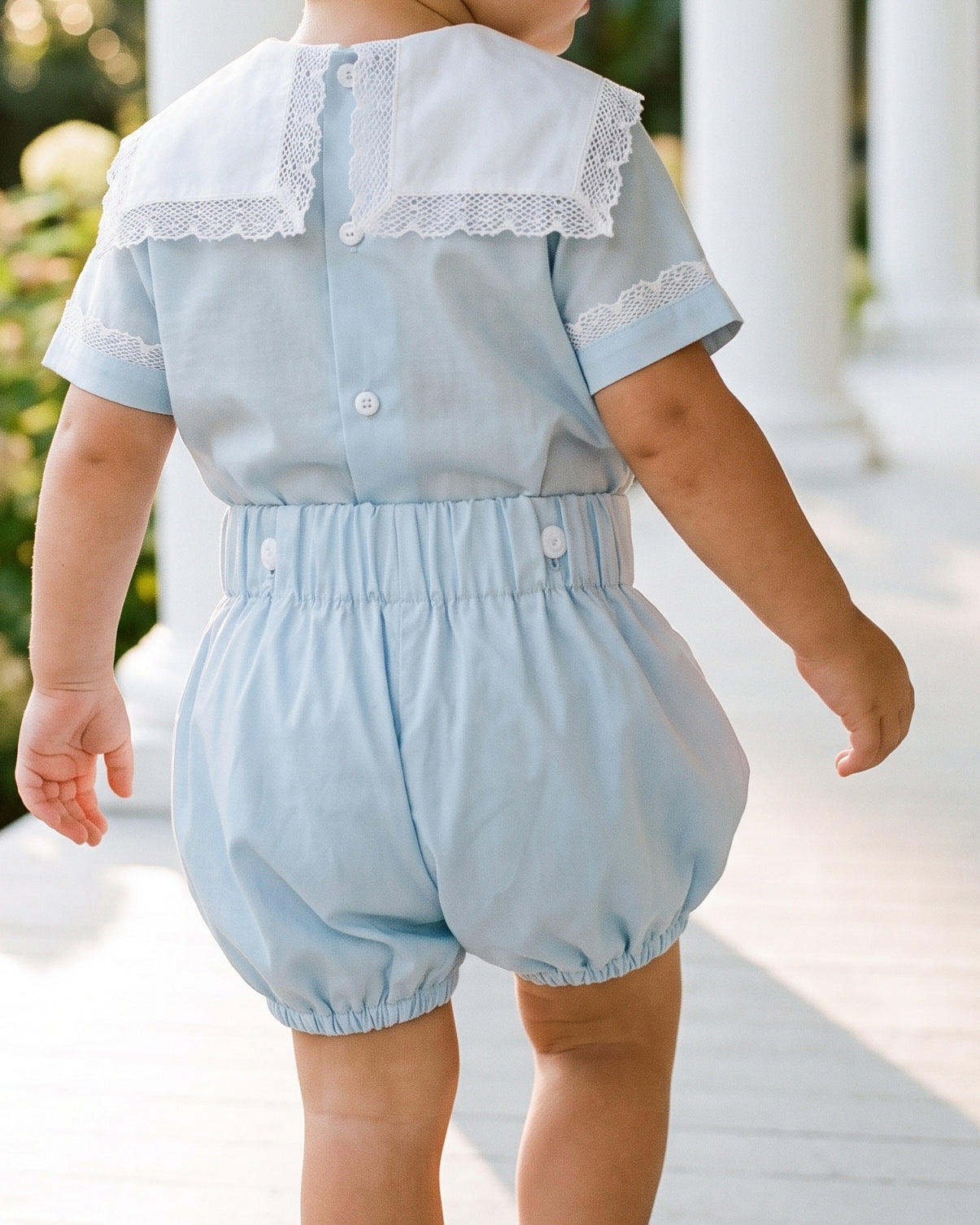 Back view of baby boy white cotton and ivory lace bloomer set — Henry Lace Bloomer by Bonbon Rue