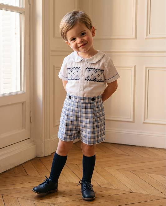 Hand-smocked white shirt and blue plaid shorts